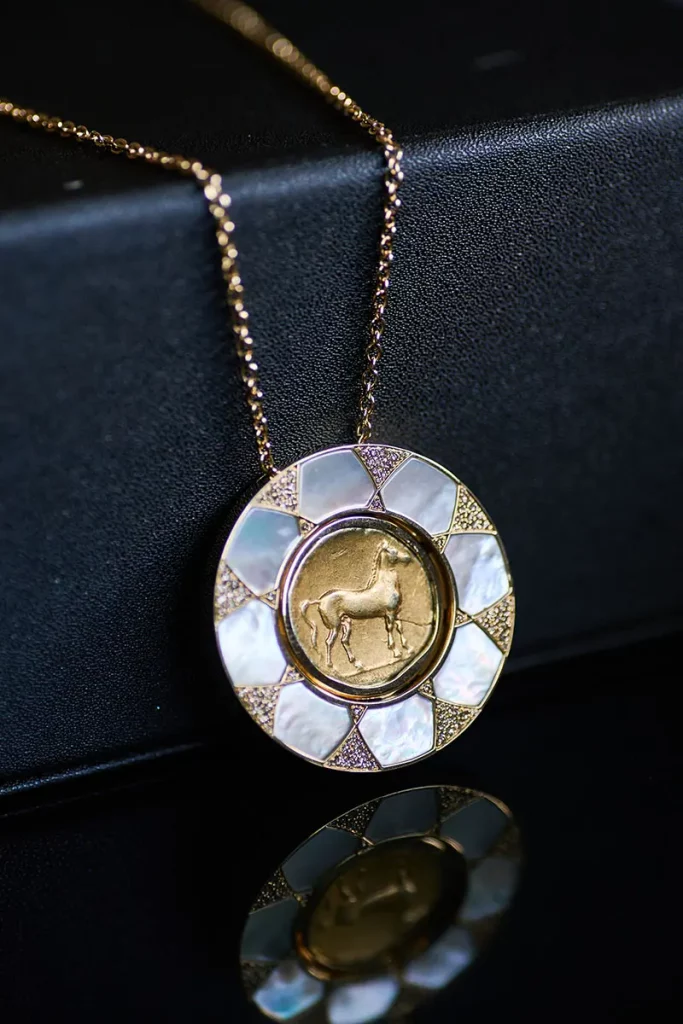 Tanit gold coin necklace beauty image 03